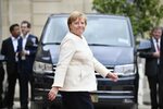 Меркель под прицелом фотокамер: теперь у канцлера Германии з